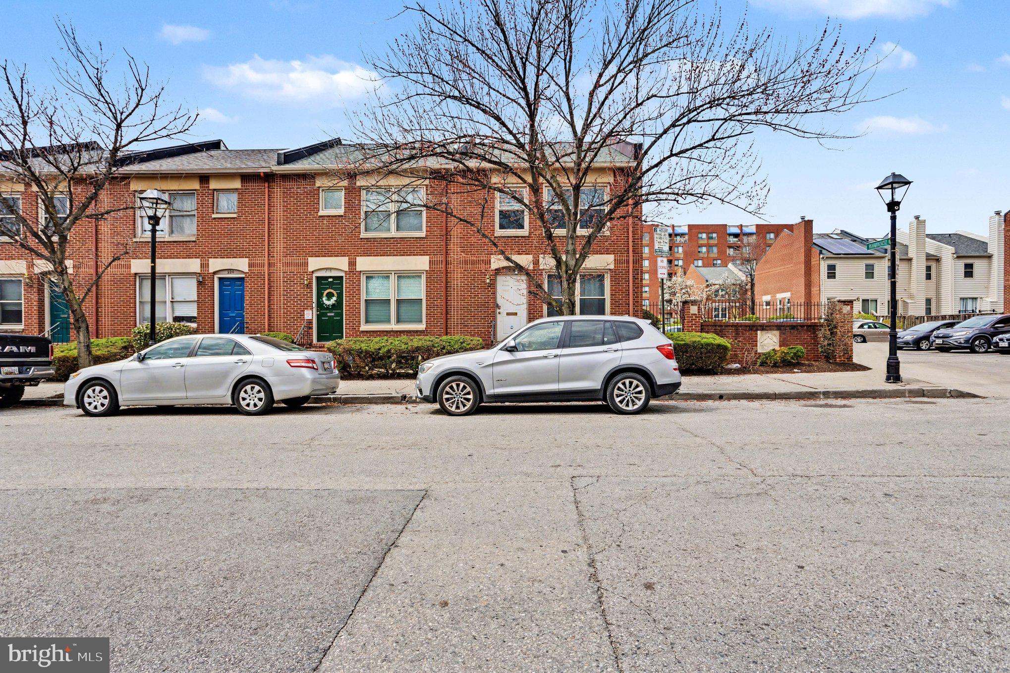216 Scott Street Baltimore, MD 21230 - Photo 2 of 27 a view of a cars parked on the side of a street