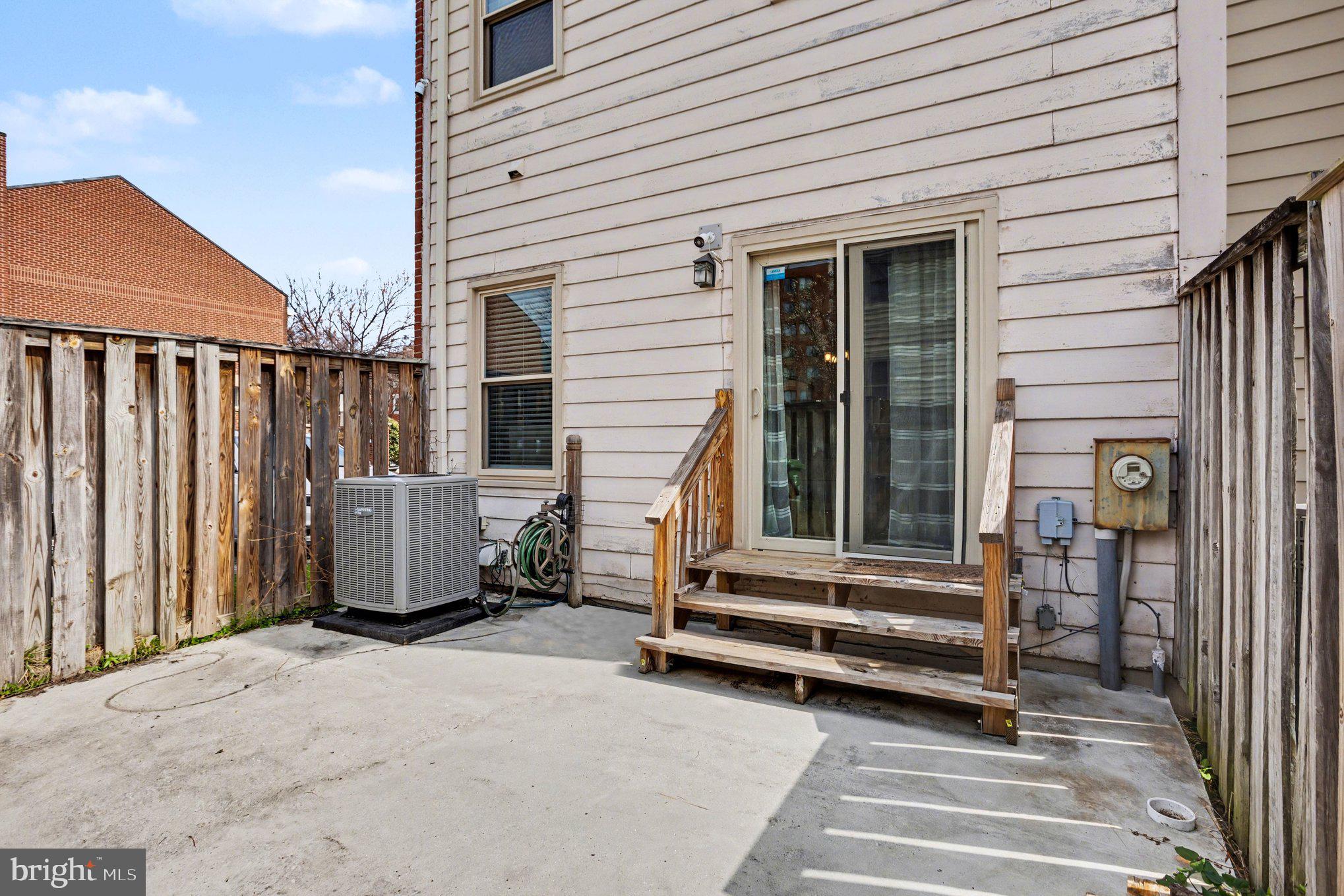 216 Scott Street Baltimore, MD 21230 - Photo 25 of 27 a view of a two chairs in the balcony