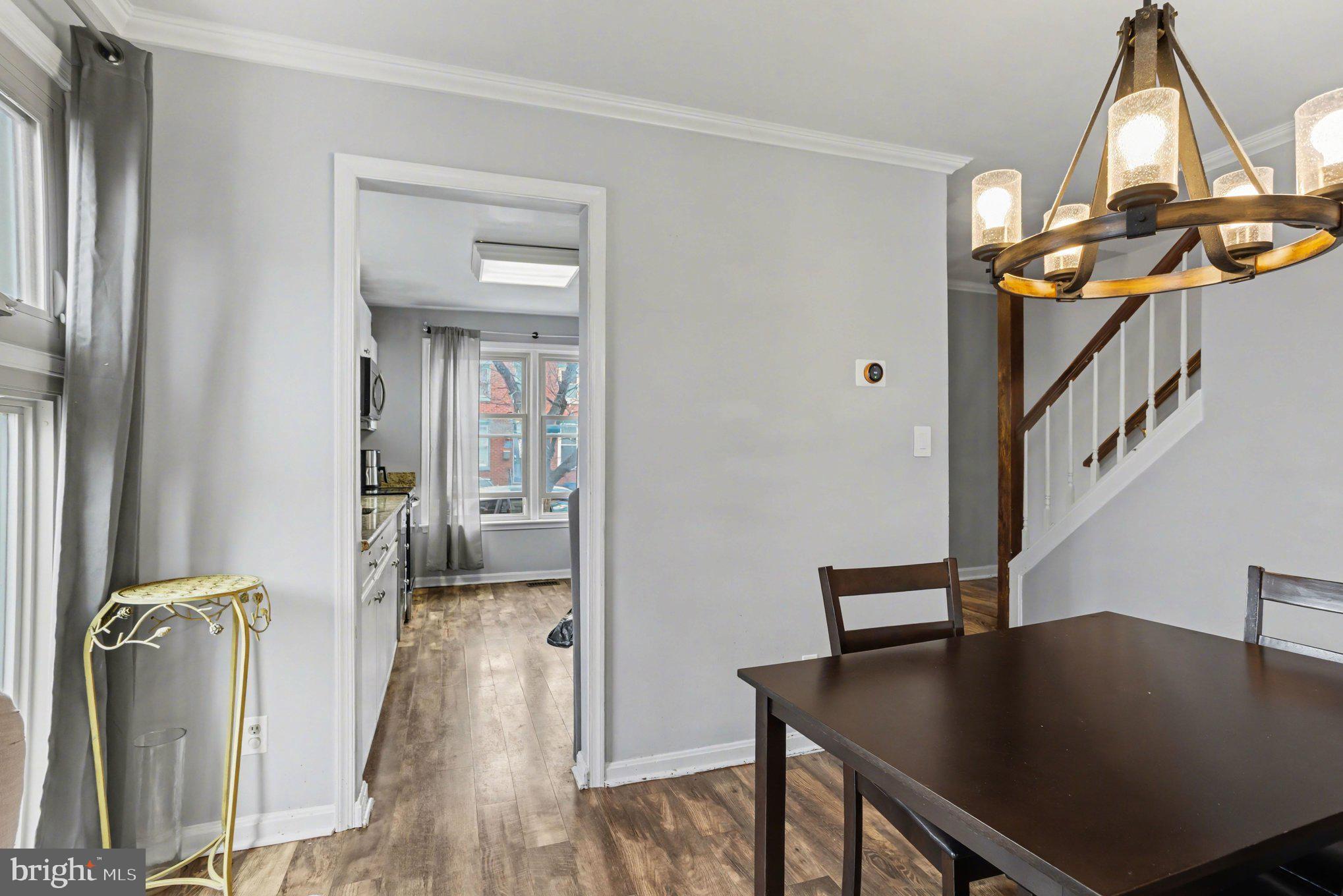 216 Scott Street Baltimore, MD 21230 - Photo 7 of 27 a view of a hallway with furniture and a window