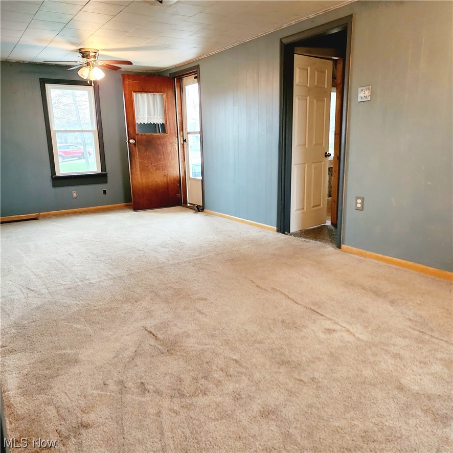 6923 Alliance Road Northwest Malvern, OH 44644 - Photo 7 of 24 Living room showing front door