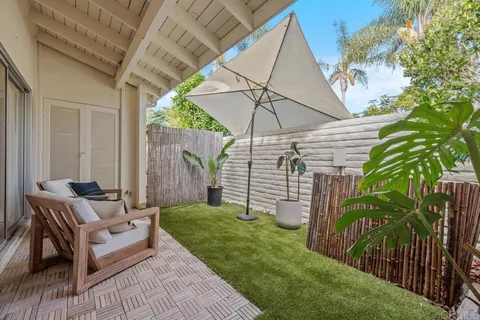 a view of yard with patio