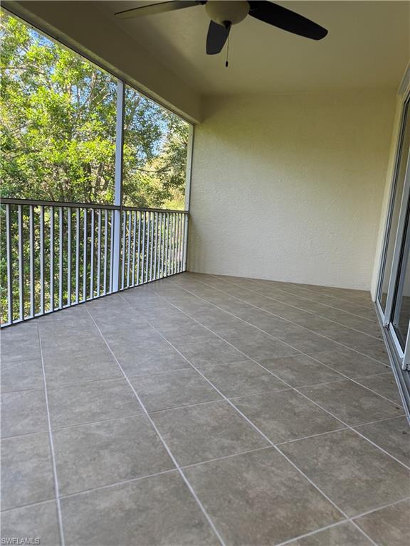1345 Henley Street, Unit 705 Naples, FL 34105 - Photo 25 of 26 a view of a room with a large window