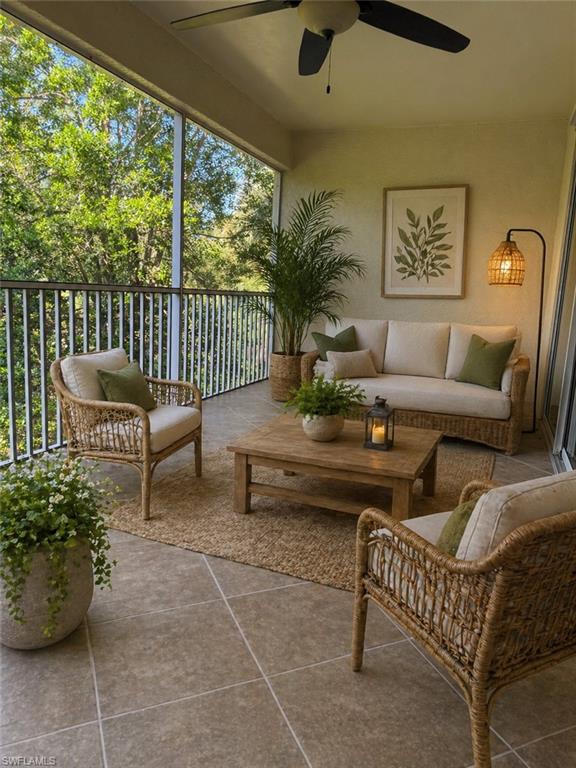1345 Henley Street, Unit 705 Naples, FL 34105 - Photo 26 of 26 a living room with furniture and a large window