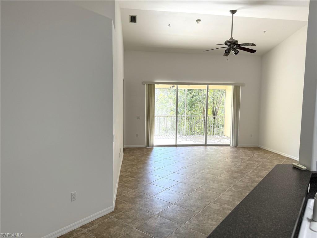 1345 Henley Street, Unit 705 Naples, FL 34105 - Photo 5 of 26 a view of an empty room with a window