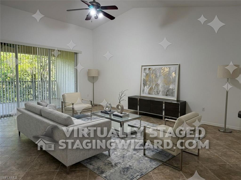 1345 Henley Street, Unit 705 Naples, FL 34105 - Photo 6 of 26 a living room with furniture and large windows