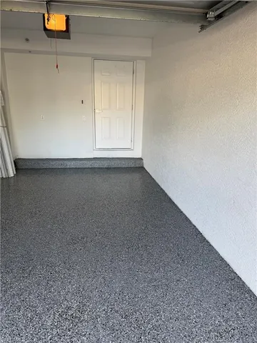 a bathroom with a glass door shower