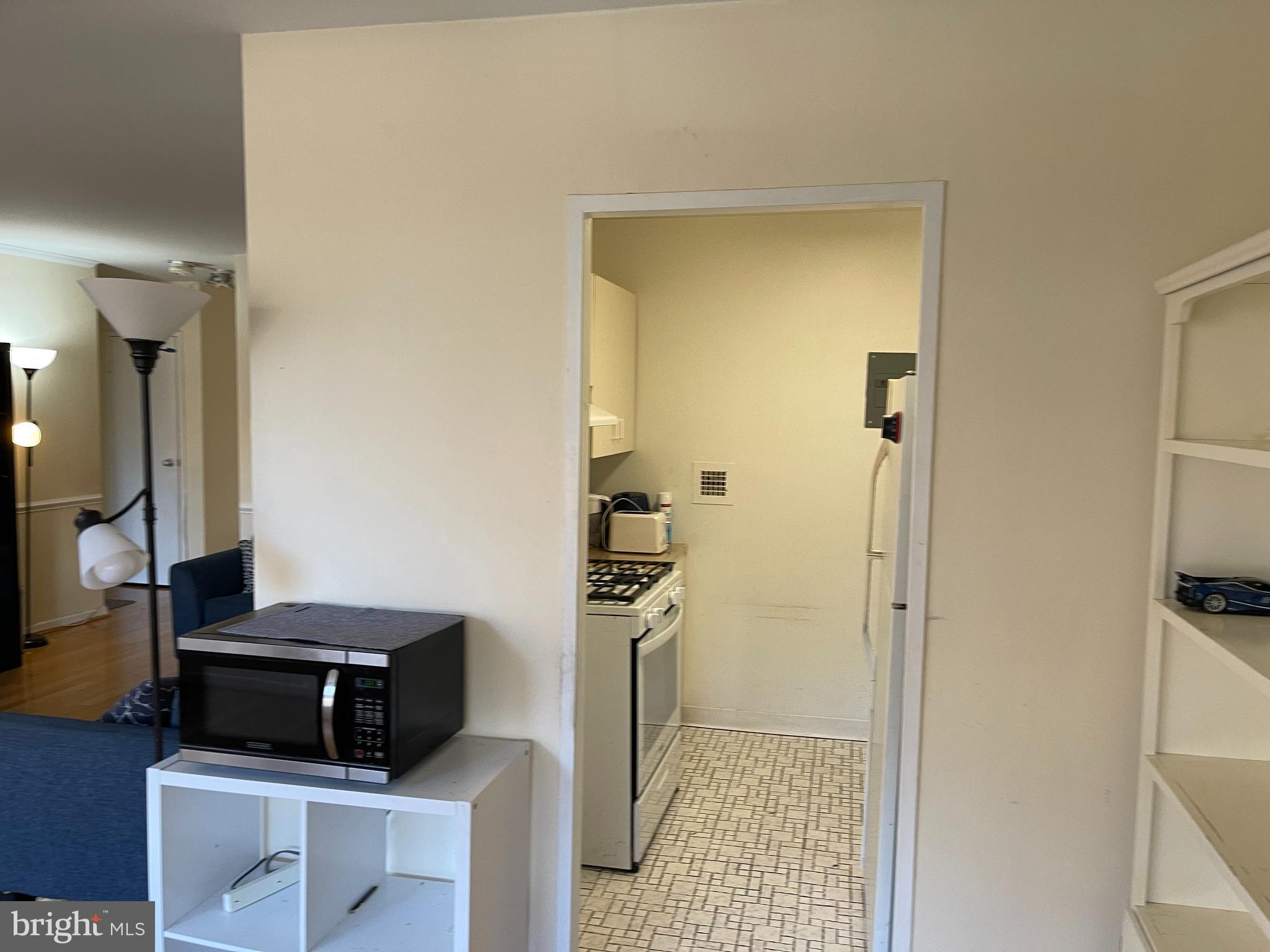 940 25th Street Northwest, Unit 317S Washington, DC 20037 - Photo 12 of 22 a view of kitchen and utility room