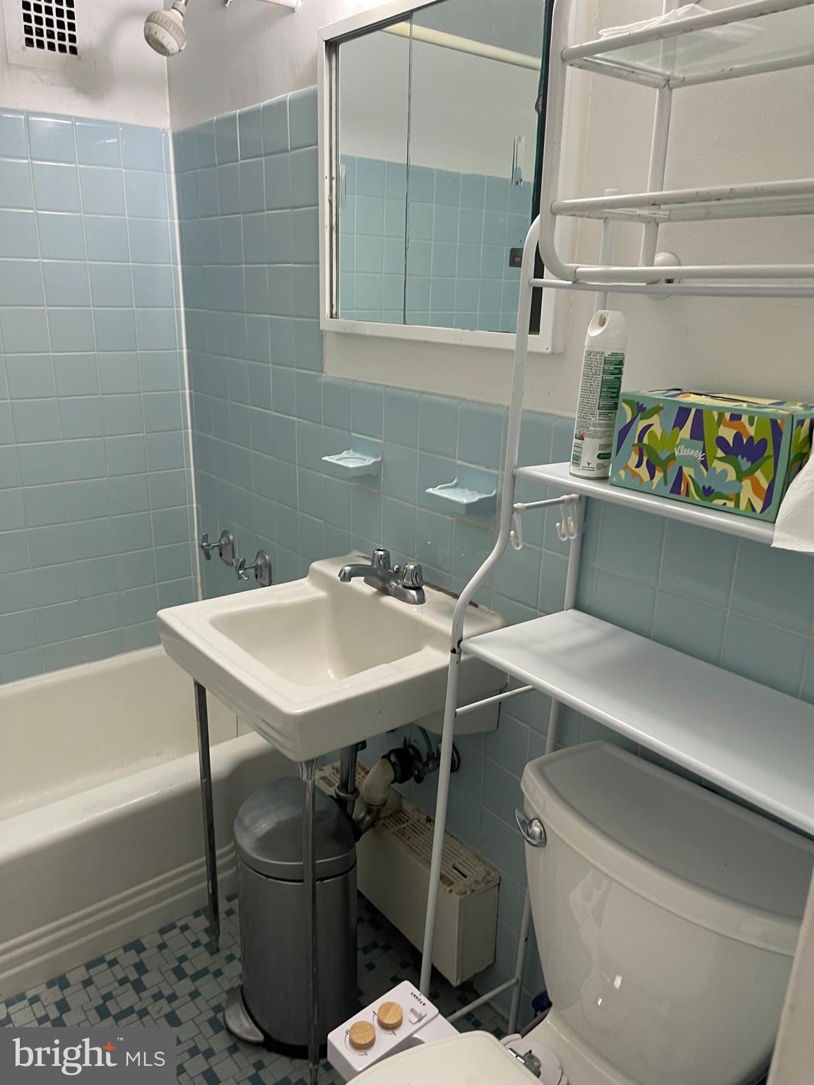 940 25th Street Northwest, Unit 317S Washington, DC 20037 - Photo 18 of 22 a bathroom with a sink and a toilet