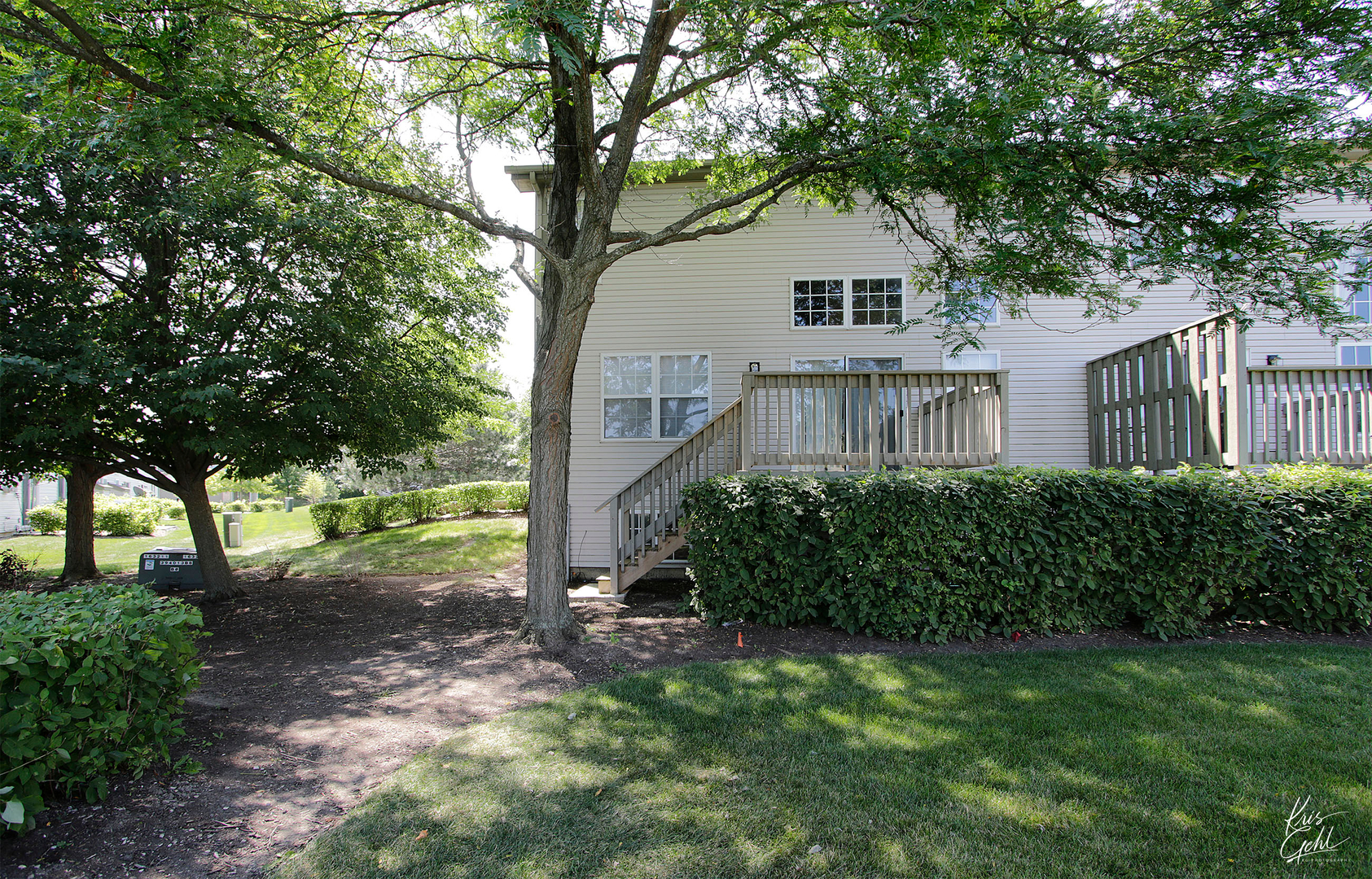 571 Willow Way Lindenhurst, IL 60046 - Photo 19 of 22 a front view of a house with a yard