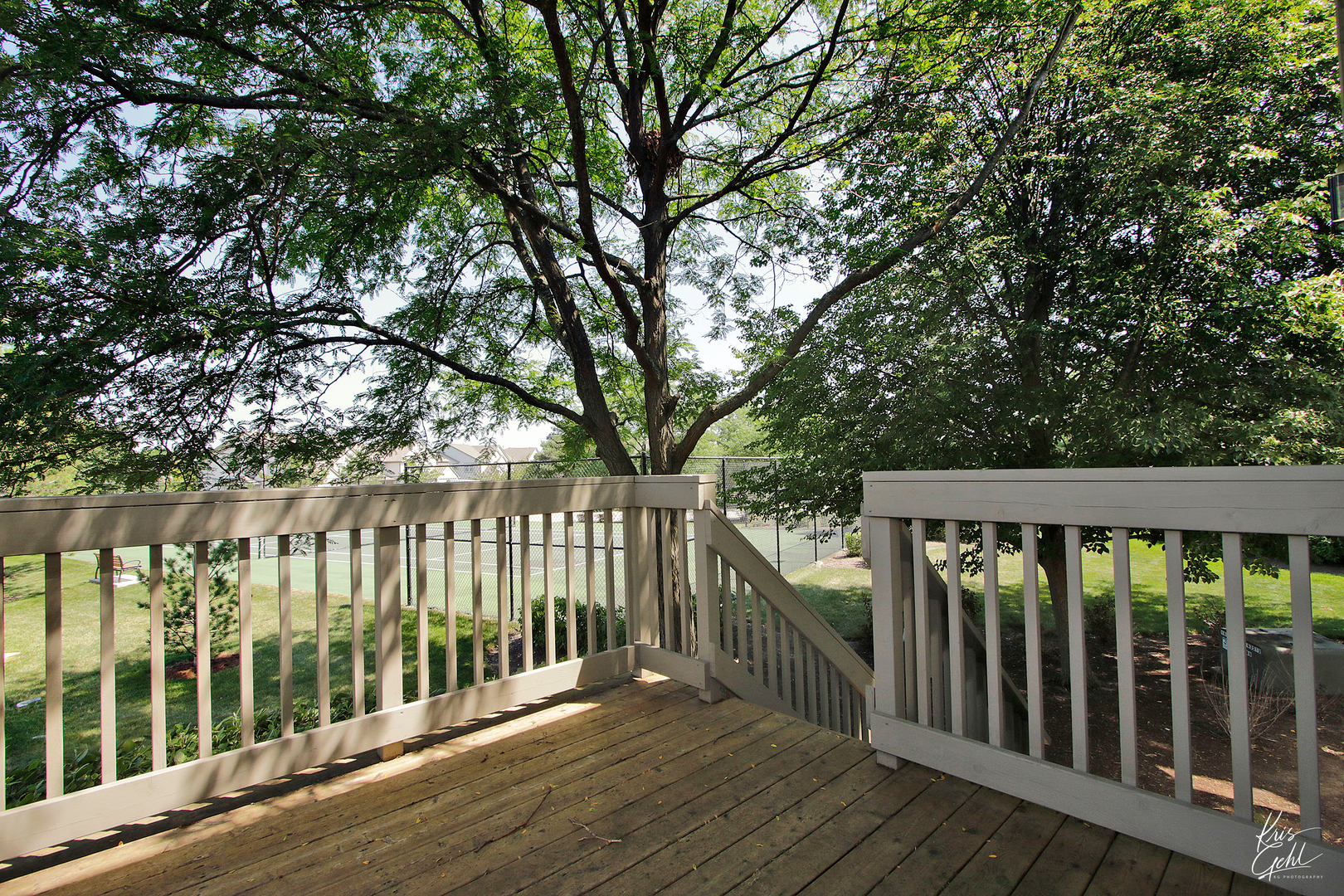571 Willow Way Lindenhurst, IL 60046 - Photo 21 of 22 a view of a wooden roof deck
