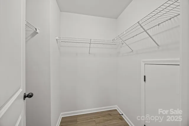 a view of a room with racks on the wall