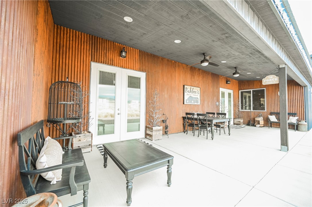 6510 Sunset Drive Caliente, NV 89008 - Photo 12 of 84 View of patio featuring french doors, outdoor dining area, and ceiling fan