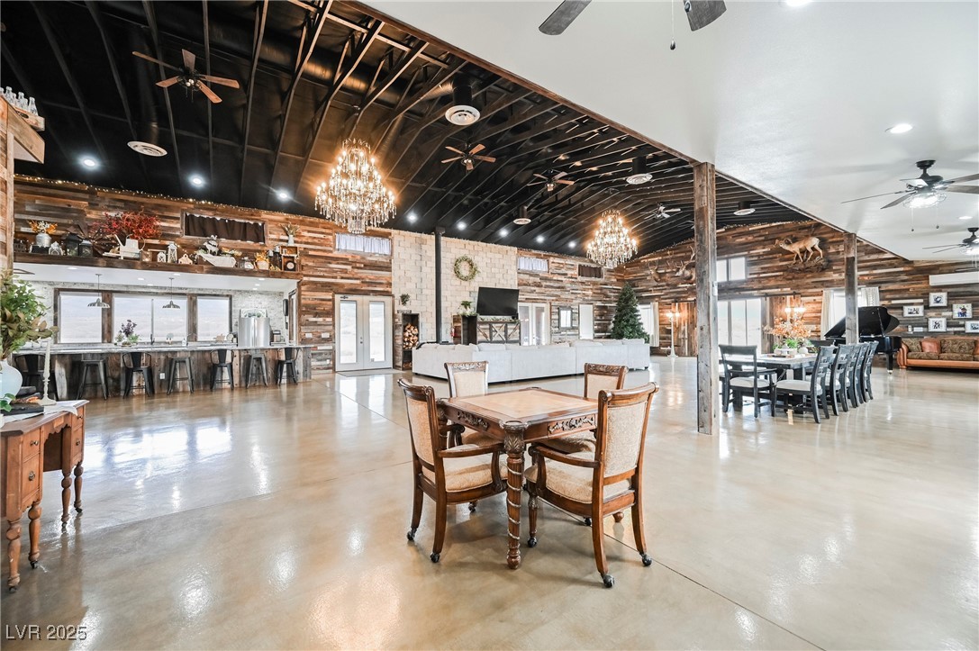 6510 Sunset Drive Caliente, NV 89008 - Photo 22 of 84 Dining space with a ceiling fan, plenty of natural light, and finished concrete flooring