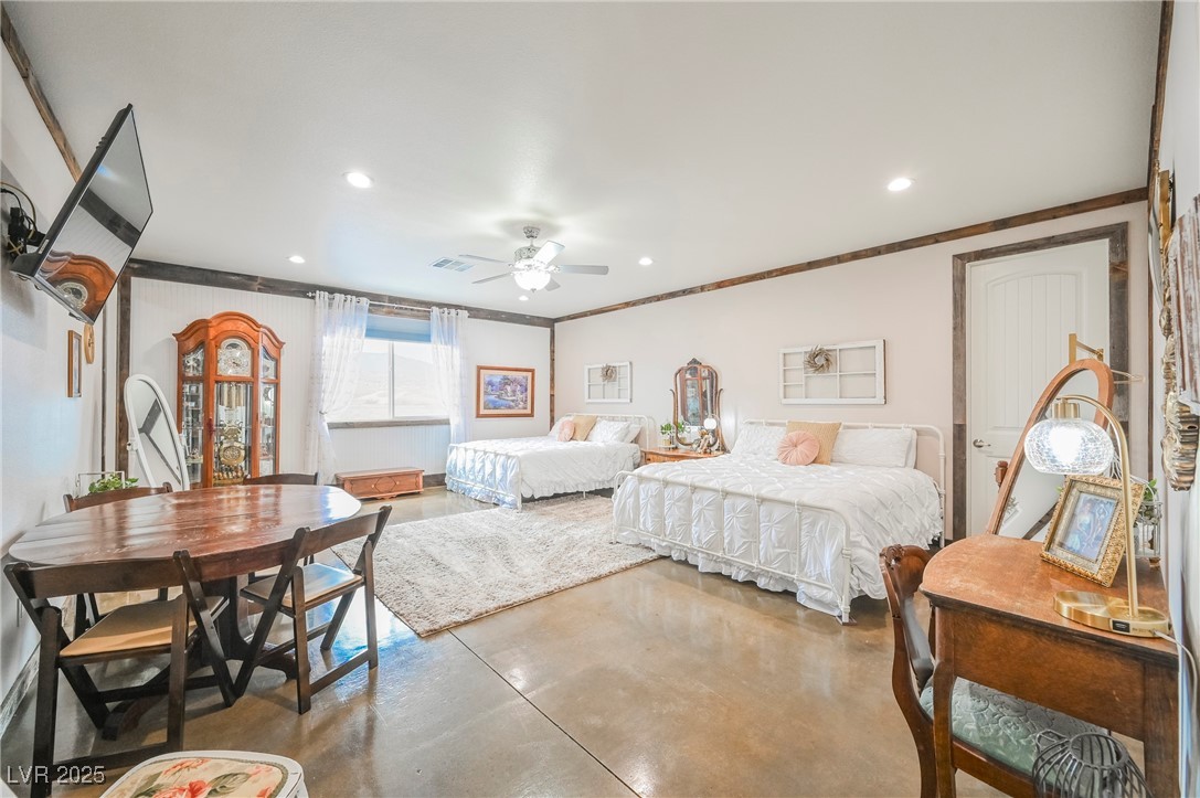 6510 Sunset Drive Caliente, NV 89008 - Photo 46 of 84 Bedroom featuring concrete flooring, ornamental molding, recessed lighting, and a ceiling fan