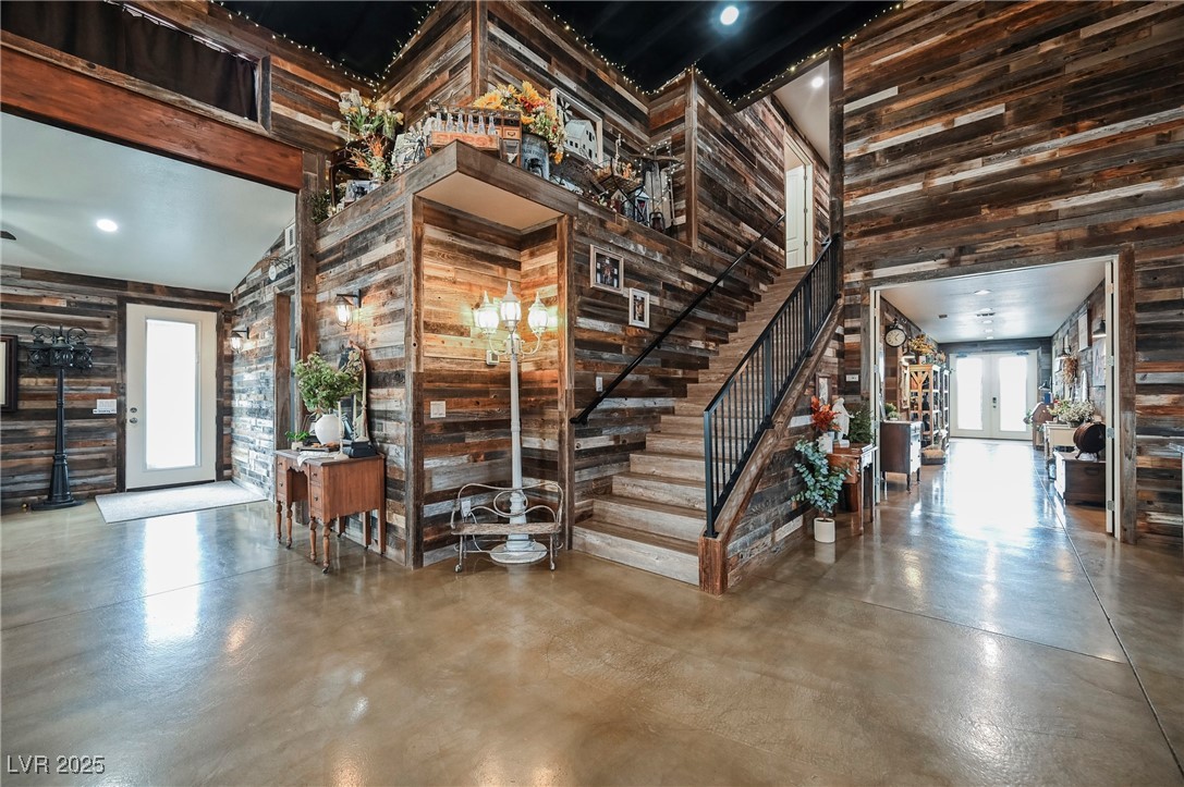 6510 Sunset Drive Caliente, NV 89008 - Photo 5 of 84 Building lobby with a towering ceiling, stairway, and wood walls