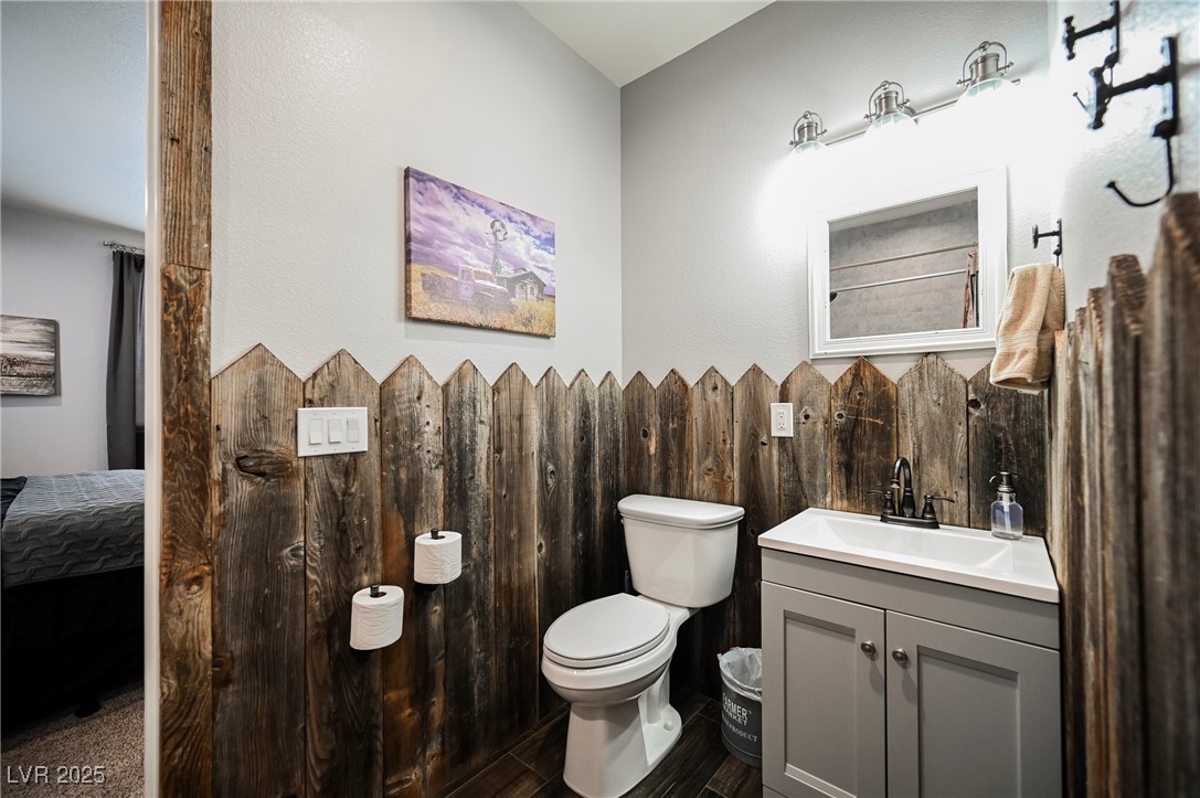 6510 Sunset Drive Caliente, NV 89008 - Photo 65 of 84 Bathroom featuring vanity and wood finished floors