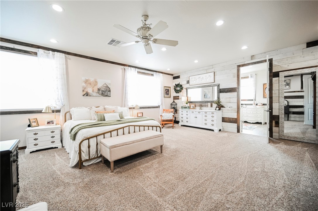6510 Sunset Drive Caliente, NV 89008 - Photo 69 of 84 Bedroom featuring carpet, wood walls, recessed lighting, and ceiling fan