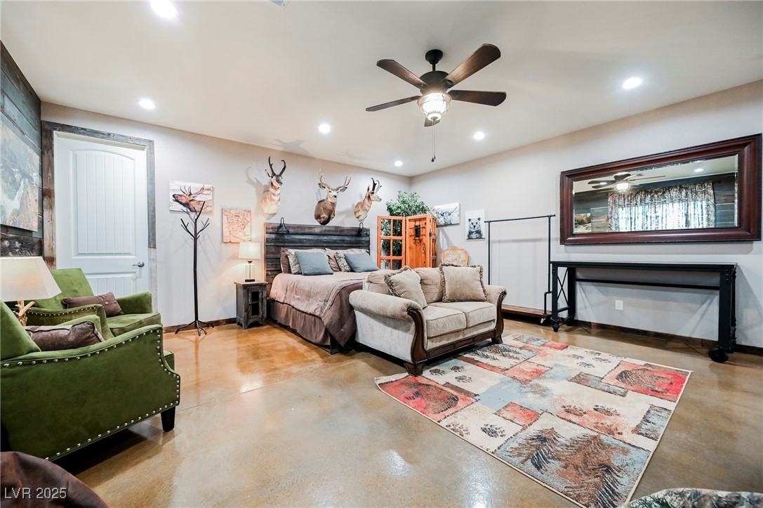 6510 Sunset Drive Caliente, NV 89008 - Photo 72 of 84 Bedroom featuring finished concrete floors, recessed lighting, and a ceiling fan