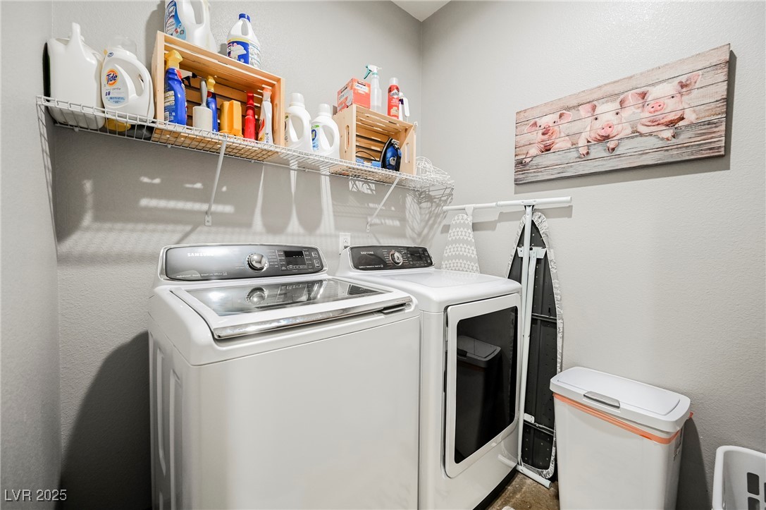 6510 Sunset Drive Caliente, NV 89008 - Photo 73 of 84 Laundry room with washer and dryer and a textured wall