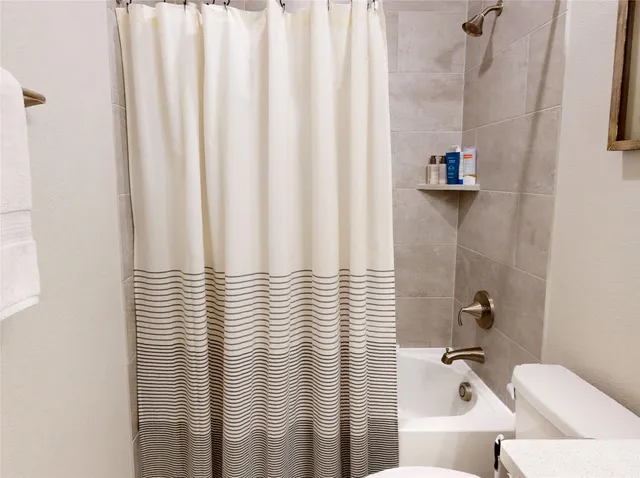 a bathroom with a sink and bathtub