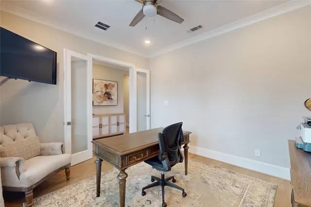 a view of a livingroom with furniture and a flat screen tv