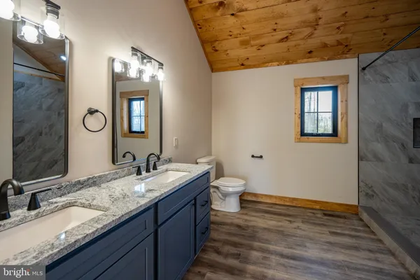 a view of an empty room with a fireplace