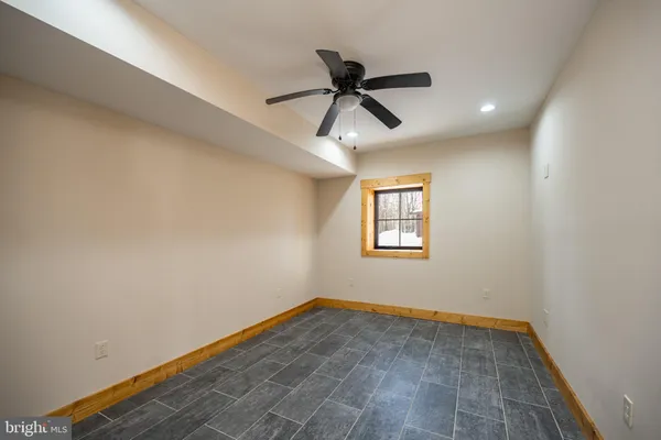 a front view of a residential apartment building with a yard