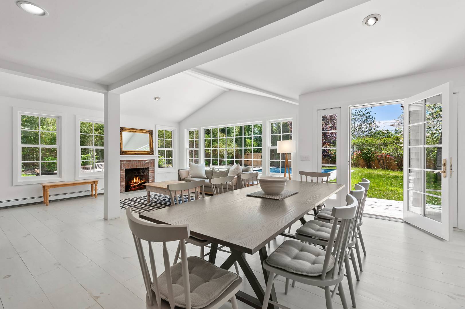 5 Willow Lane East Hampton, NY 11937 - Photo 2 of 9 a view of a dining room with furniture and wooden floor