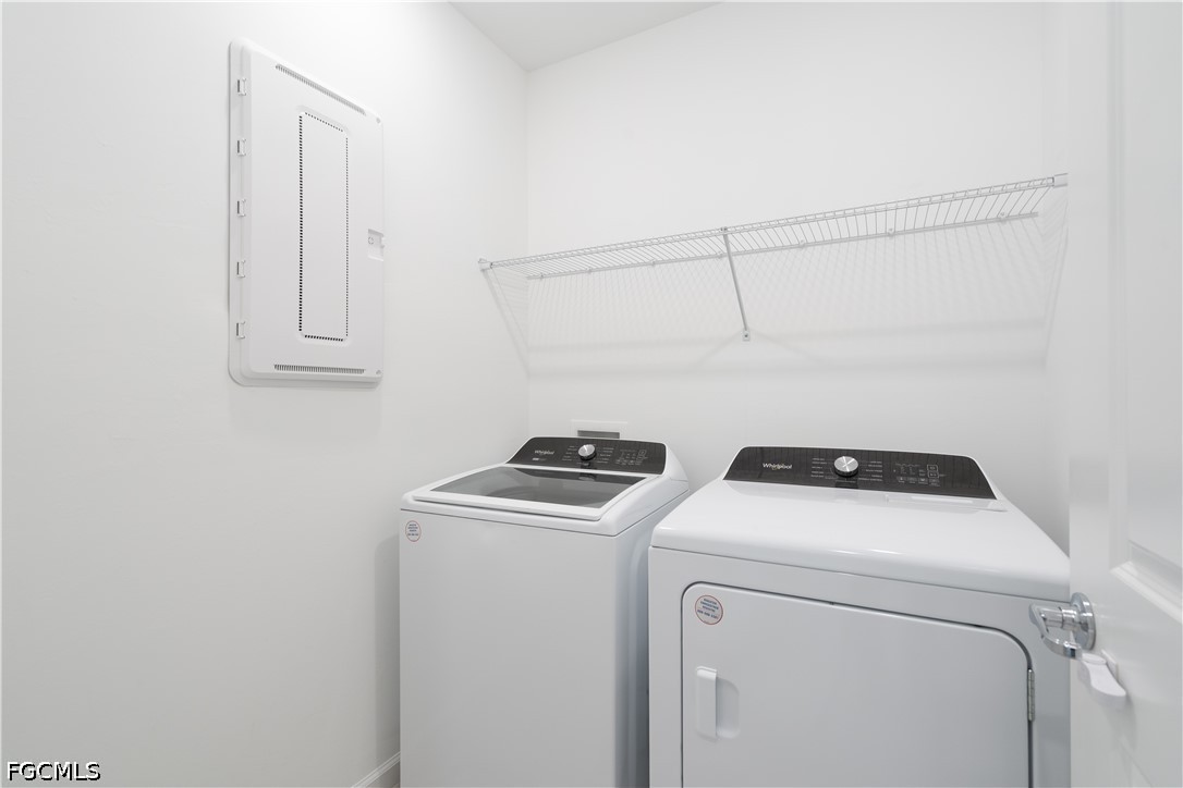 42428 Cascade Drive Punta Gorda, FL 33982 - Photo 17 of 47 a utility room with dryer and washer