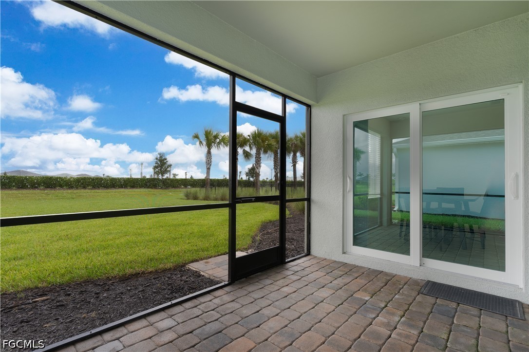 42428 Cascade Drive Punta Gorda, FL 33982 - Photo 22 of 47 a view of a porch with a yard