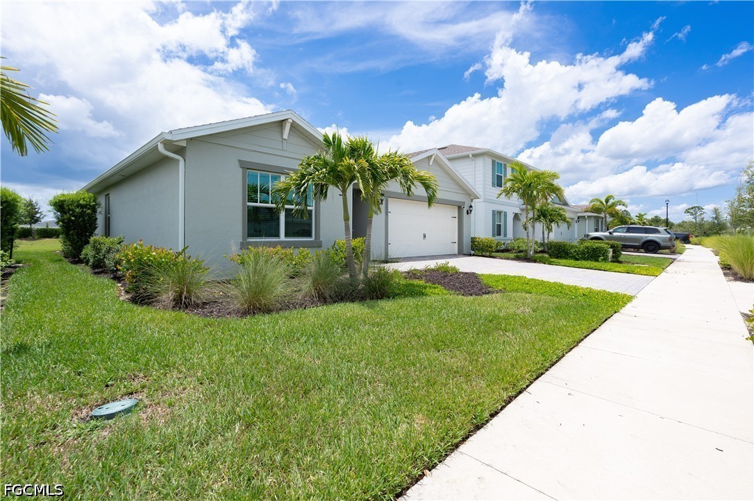 42428 Cascade Drive Punta Gorda, FL 33982 - Photo 25 of 47 a front view of house with garden