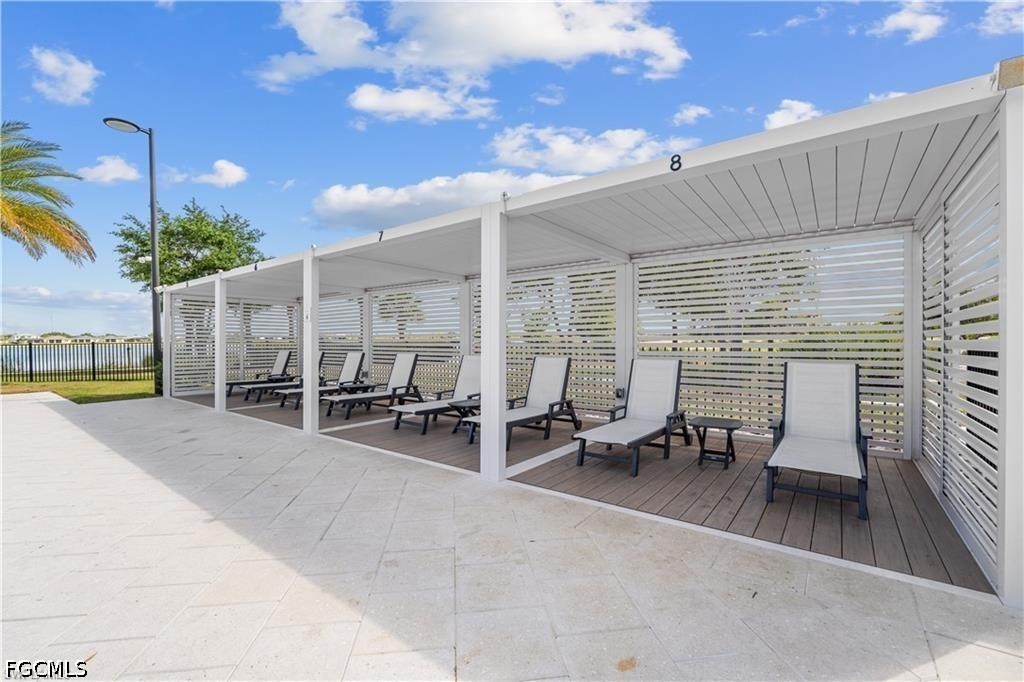 42428 Cascade Drive Punta Gorda, FL 33982 - Photo 37 of 47 a view of a patio with chairs and tables