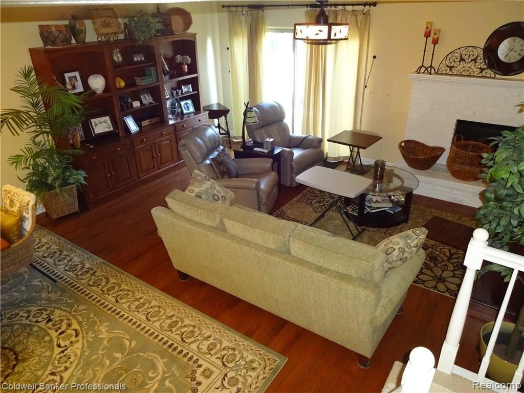 545 Tennyson, Unit 43 Rochester, MI 48307 - Photo 4 of 22 Great Room with gas fireplace