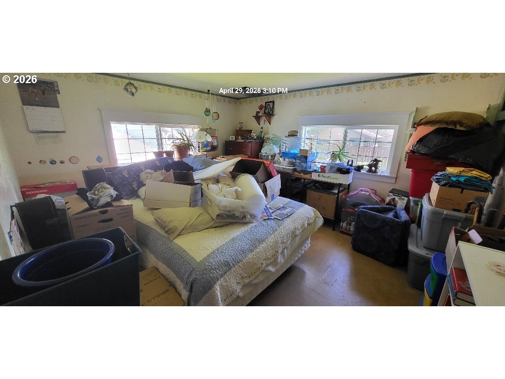 1439 Union Avenue North Bend, OR 97459 - Photo 15 of 23 a living room with furniture and a window
