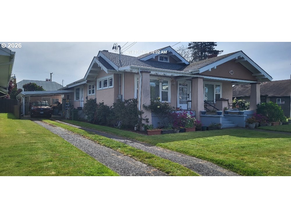 1439 Union Avenue North Bend, OR 97459 - Photo 2 of 23 a front view of a house with a yard