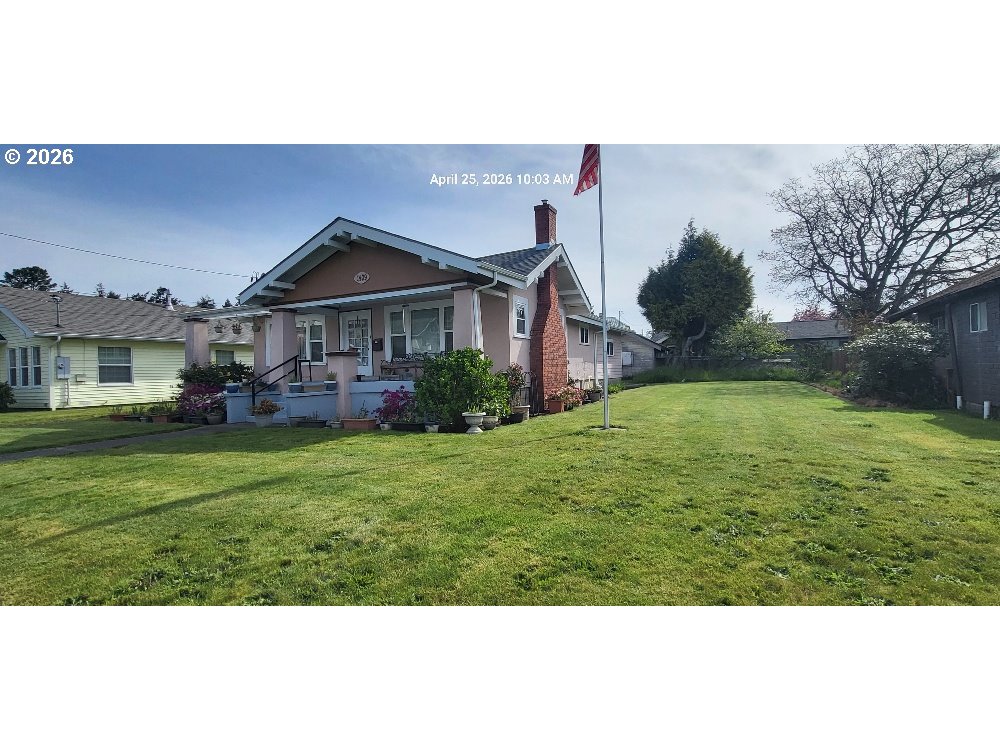 1439 Union Avenue North Bend, OR 97459 - Photo 3 of 23 a front view of a house with garden