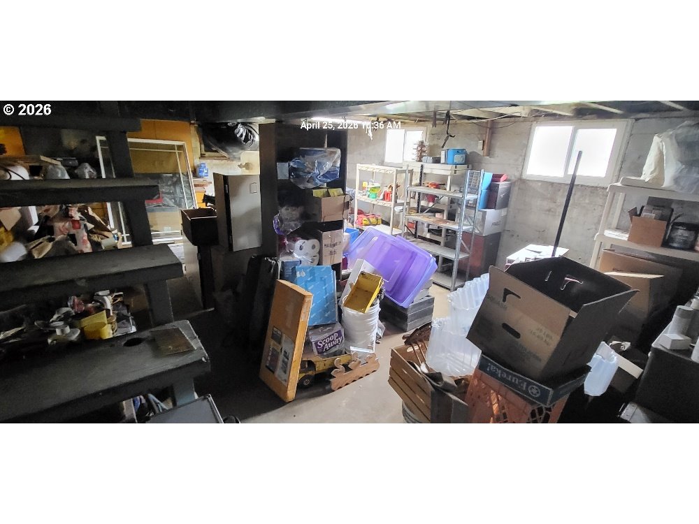 1439 Union Avenue North Bend, OR 97459 - Photo 4 of 23 a view of workspace with lots of clutter