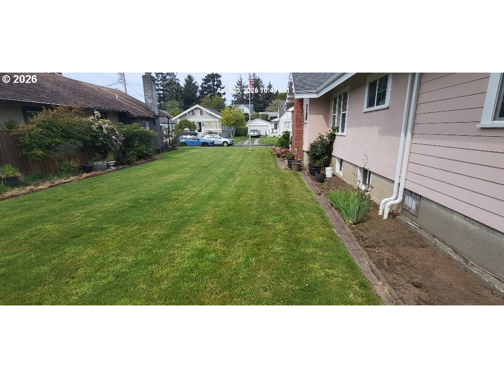 1439 Union Avenue North Bend, OR 97459 - Photo 10 of 23 a view of a house with a yard