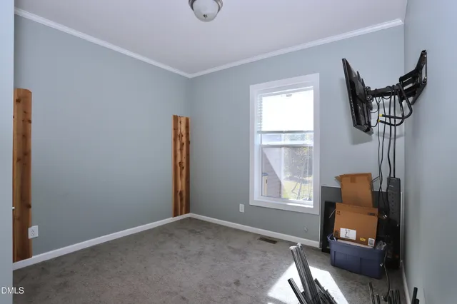 a view of a livingroom with a flat screen tv