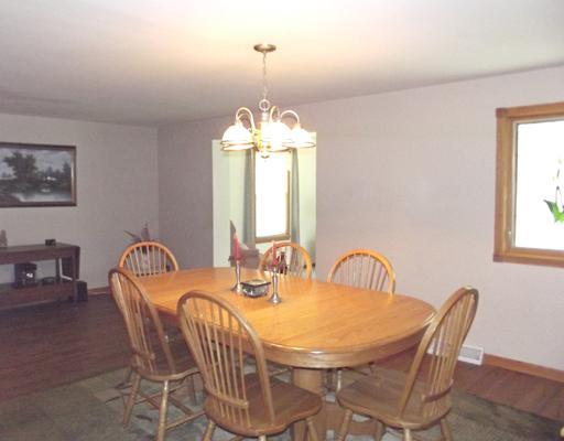 1313 Old Princeton Road New Castle, PA 16101 - Photo 6 of 18 Dining Room. The large dining room features a beautiful stained glass window and gorgeous laminate floors.