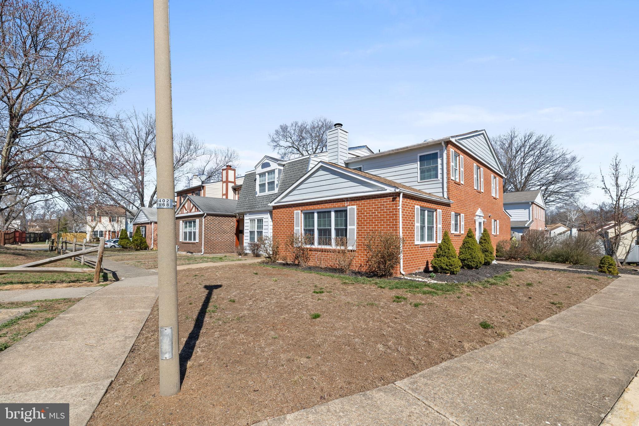 3716 Tavern Way Triangle, VA 22172 - Photo 4 of 32 Brick front with large side yard