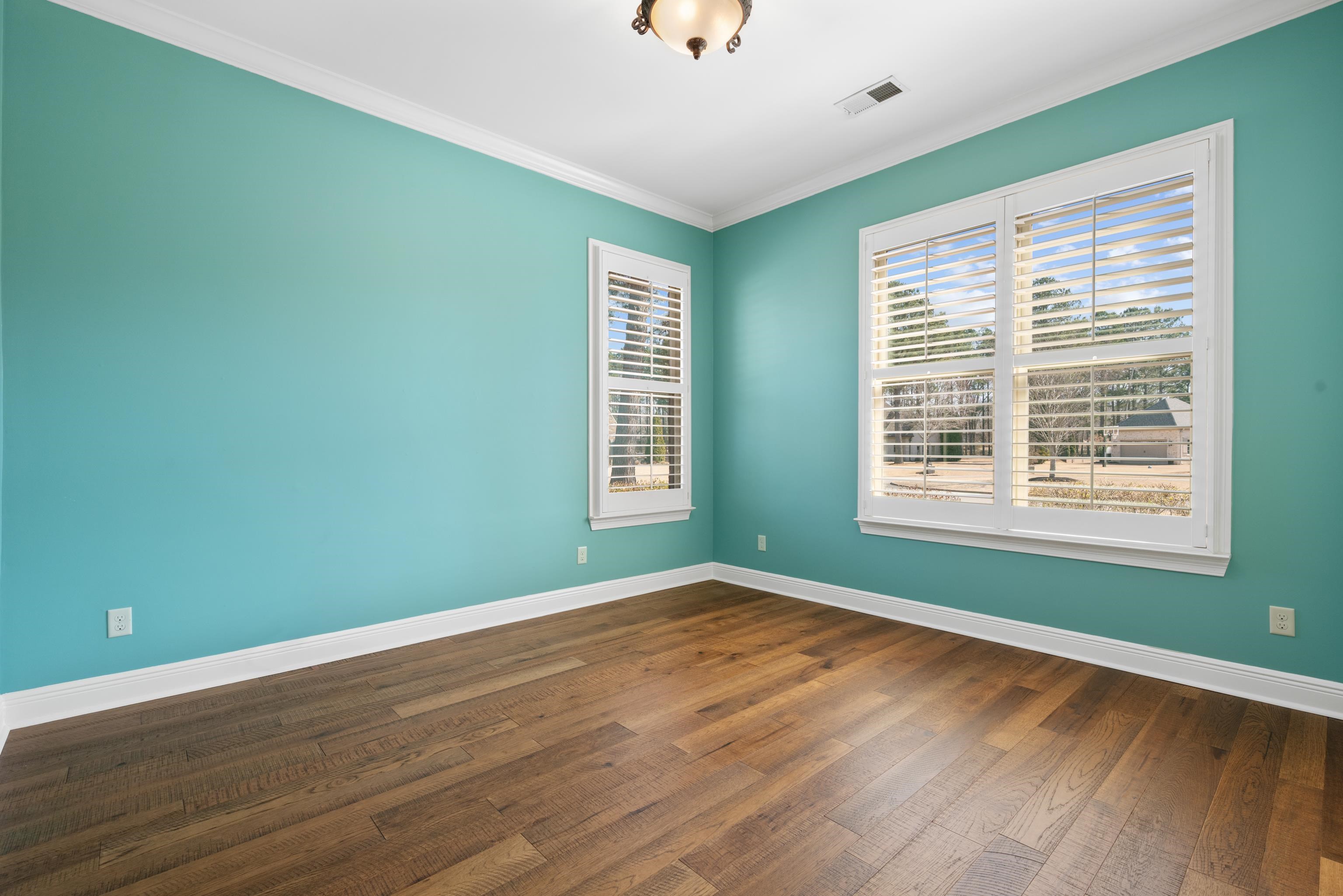 25 Riversedge Cove North Arlington, TN 38002 - Photo 5 of 40 a view of a room with wooden floor and windows