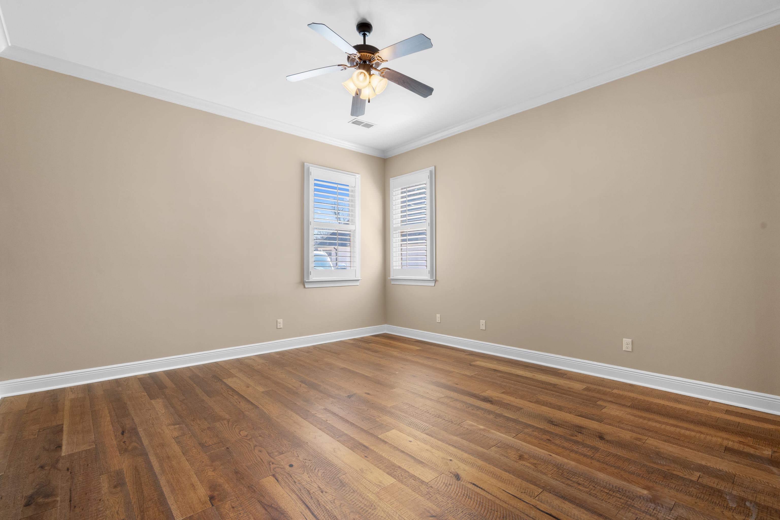 25 Riversedge Cove North Arlington, TN 38002 - Photo 9 of 40 wooden floor in an empty room with a window