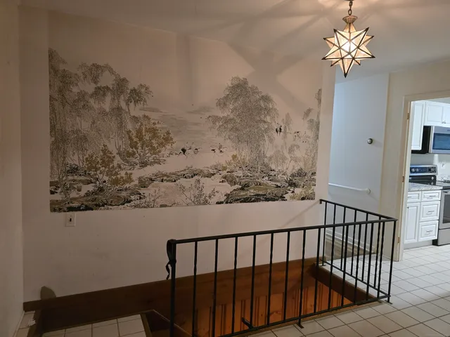 a view of a balcony with a flower pot