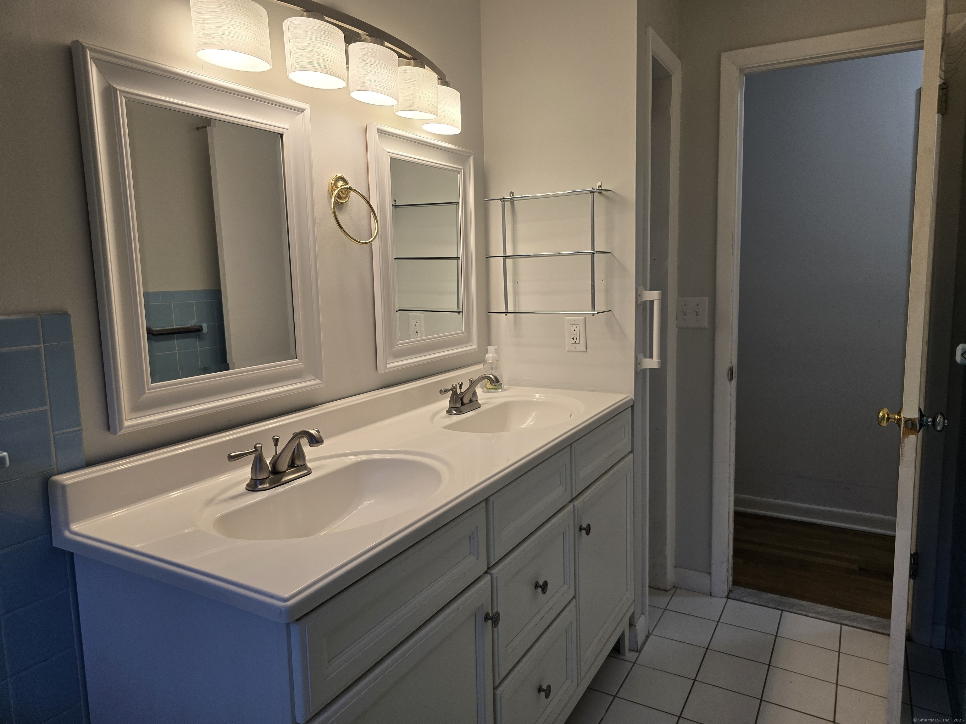 32 Old Green Road Newtown, CT 06482 - Photo 21 of 29 a bathroom with a sink double vanity and a mirror