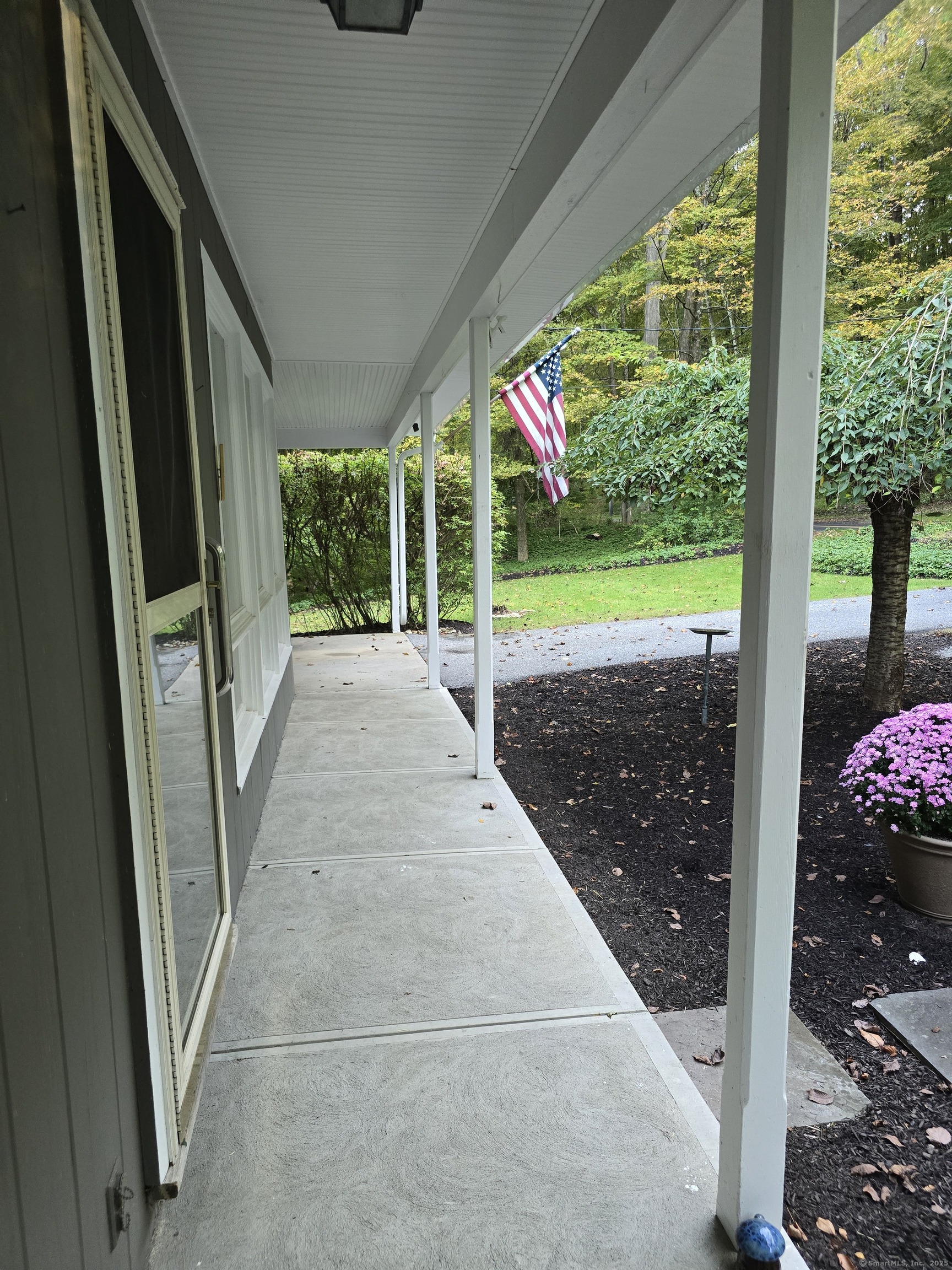 32 Old Green Road Newtown, CT 06482 - Photo 4 of 29 a view of a porch with wooden floor and outdoor space