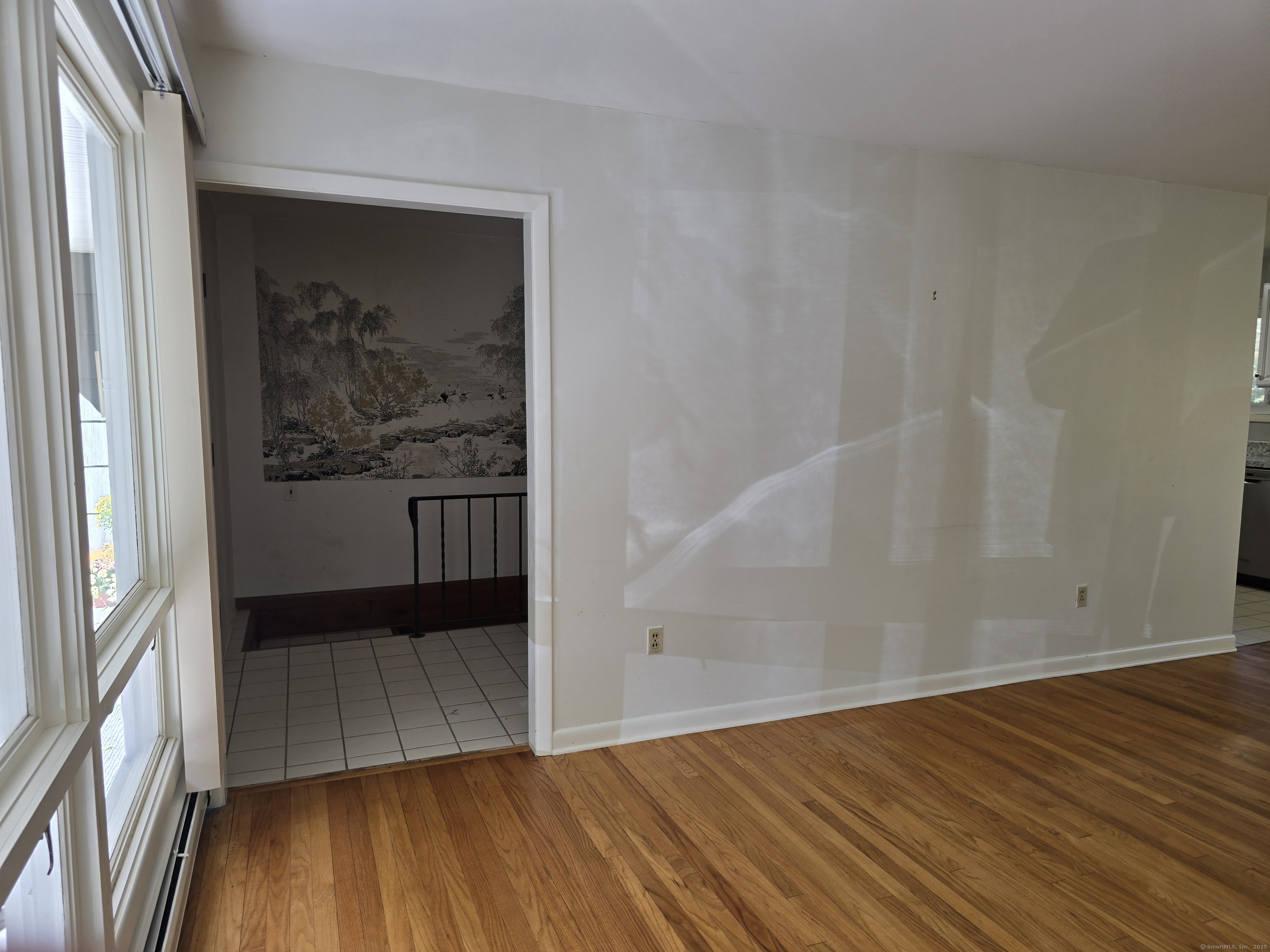 32 Old Green Road Newtown, CT 06482 - Photo 8 of 29 an empty room with wooden floor and door