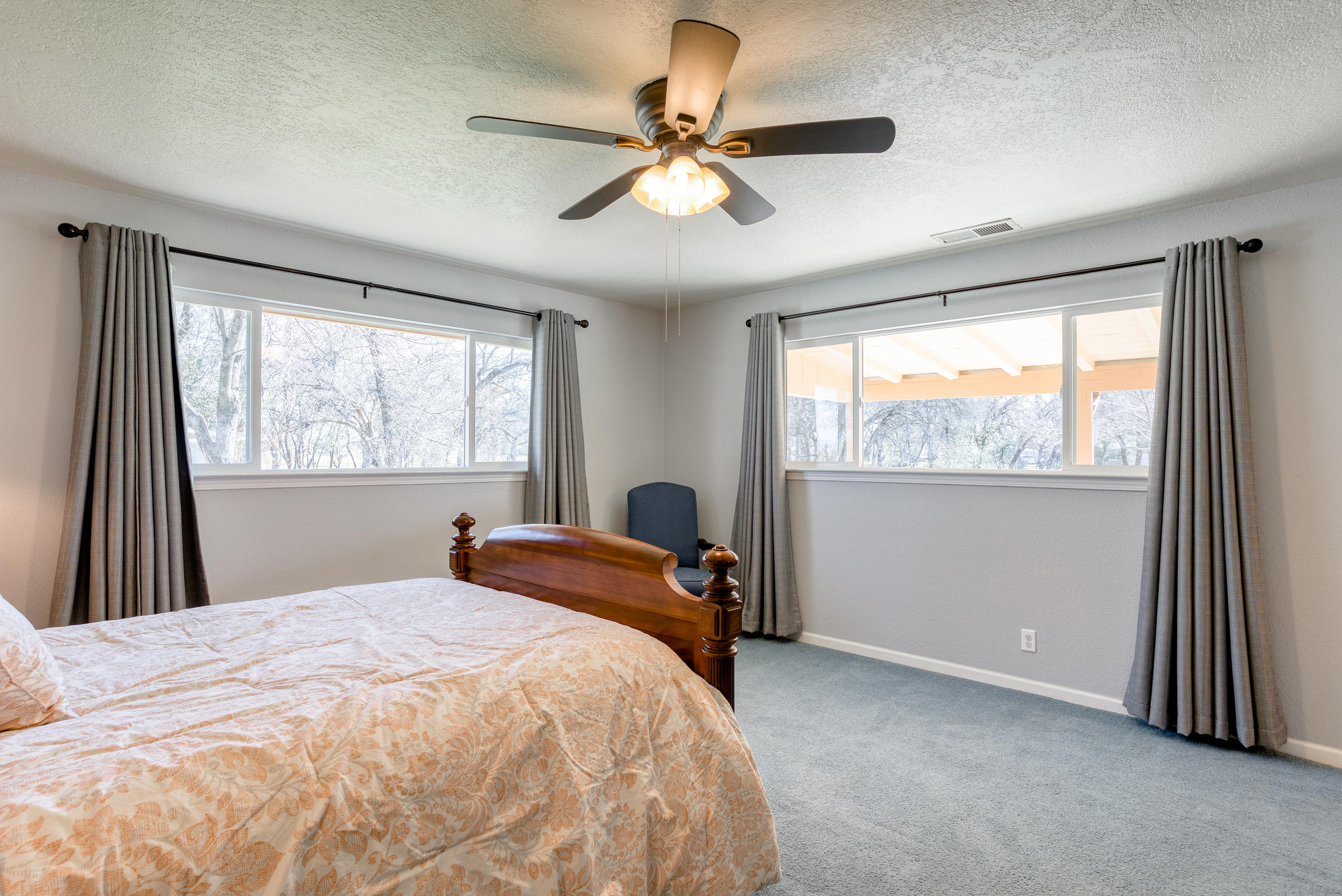 21615 Dersch Road Anderson, CA 96007 - Photo 17 of 40 Master Bed with views of pool/backyard