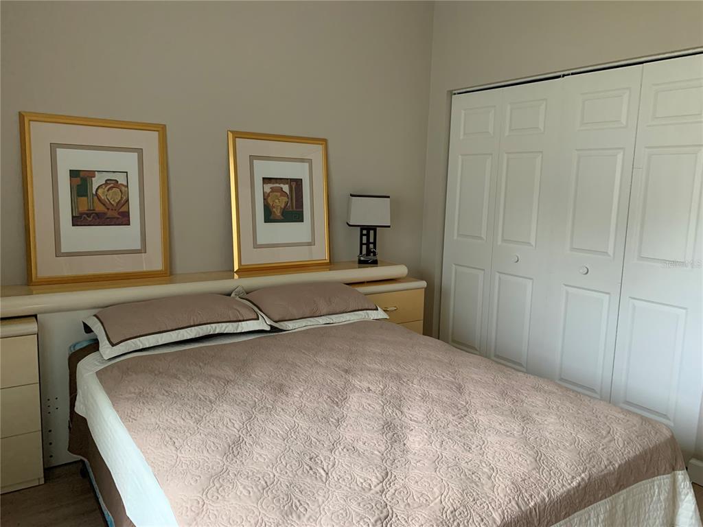 11636 Southwest 75th Circle Ocala, FL 34476 - Photo 18 of 38 a bedroom with a bed and a window