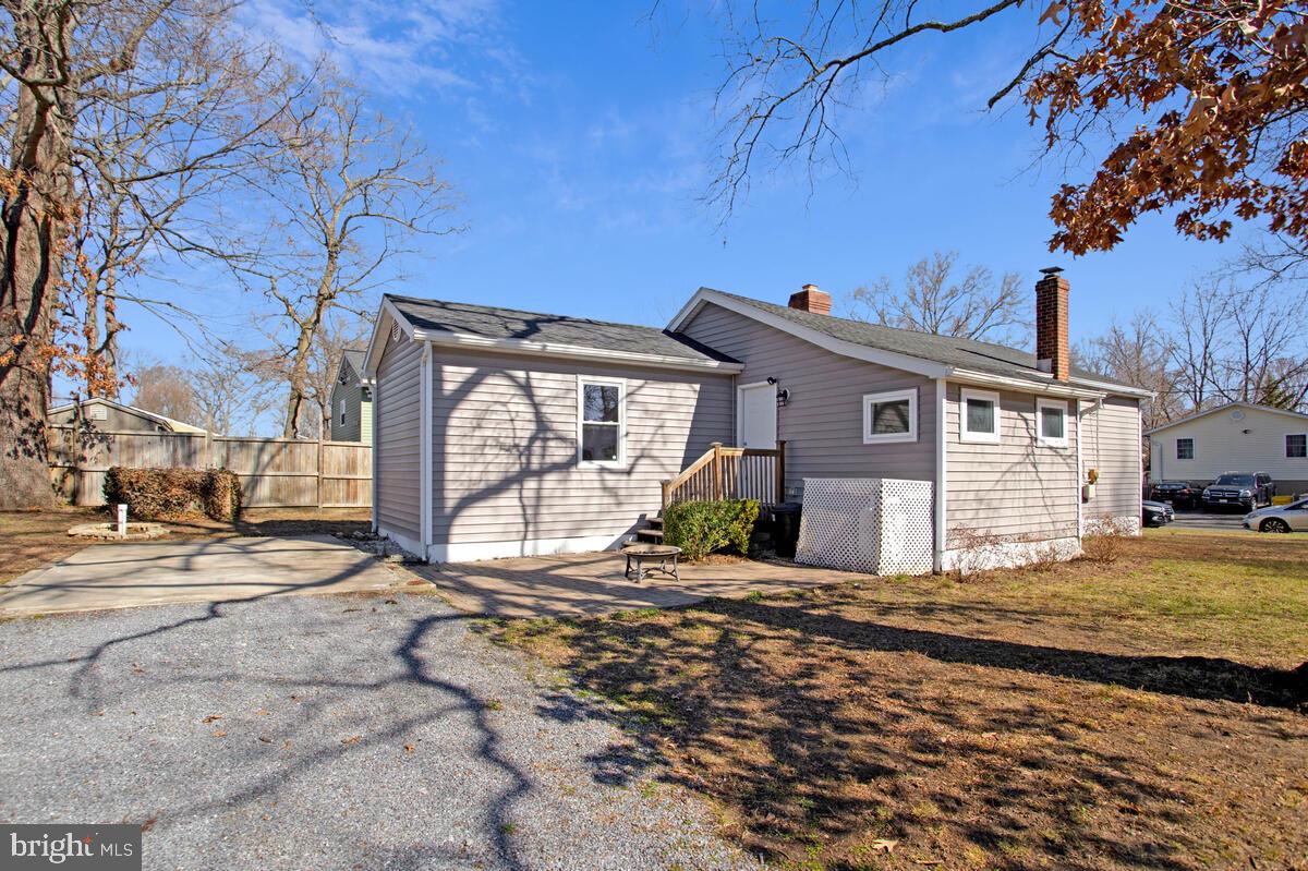 1916 Ridgeville Road Edgewater, MD 21037 - Photo 1 of 27 a view of a house with a patio